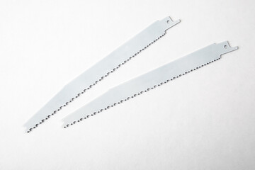 Sabre saw blades for wood and metal on a white background