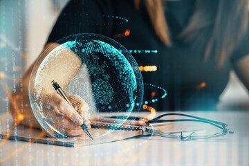 Multi exposure of hands making notes with world map hologram and data theme icons. Concept of global data.