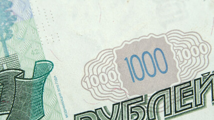 Fototapeta na wymiar Element of the 1000 Russian rubles bill. Macrophotography