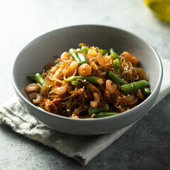Healthy rice noodles with green beans and shrimps