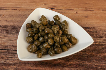 Tasty capers in the bowl