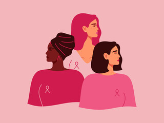 Three women with pink ribbons of different nationalities standing together. Breast cancer awareness prevention month. Concept of support and solidarity with females fighting oncological disease