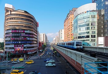 Cityscape of Downtown Taipei, the capital city of Taiwan, under blue clear sky with view of busy...
