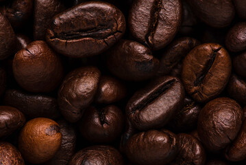 Naklejka premium abstract macro coffee bean texture background