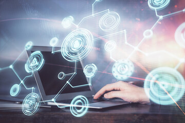 Social network theme hologram with businessman working on computer on background. Concept of world wide web. Multi exposure.