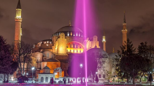 Hagia Sophia timelapse hyperlapse with a fountain illuminated at night, Christian patriarchal basilica, imperial mosque and now a museum, Istanbul, Turkey