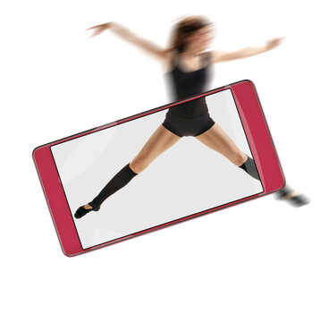 Portrait of beautiful young professional dancer on white background. conceptual image with a smartphone, demonstration of device capabilities