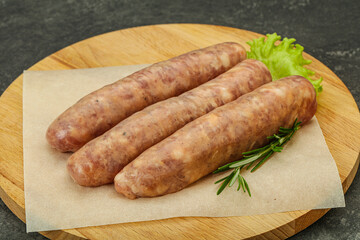 Raw pork meat sausages for grill