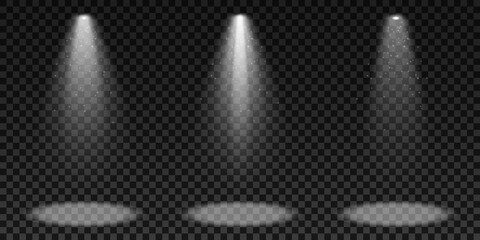 Spotlights isolated on a dark transparent background. A set of light effects. Elements for show and stage. Glowing particles. Vector illustration.