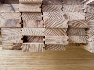 ash wood planks and parts in the shop