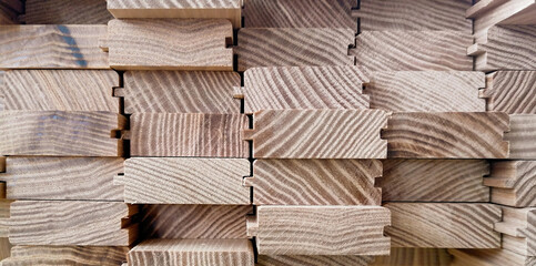 ash wood planks and parts in the shop