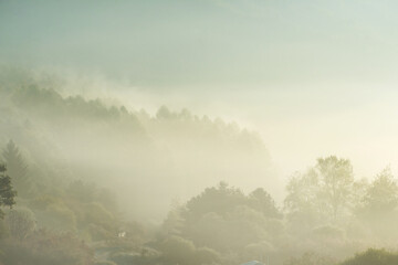Obraz na płótnie Canvas Beautiful misty morning dream valley mountain autumn fogy and clouds.