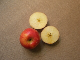 Whole and cut ripe fresh Gala apples