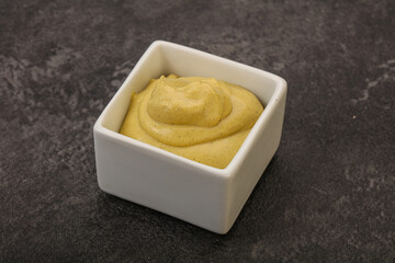 Dijon mustard sauce in the bowl