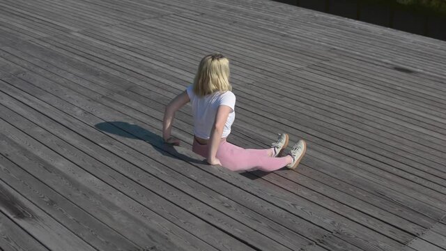 Circuit training outdoor exercise, bootcamp workout ideas. Young woman do quick at-home gym resistance fitness course. High-intense aerobics exercises build the perfect body &ndash; wellness and healthcare.