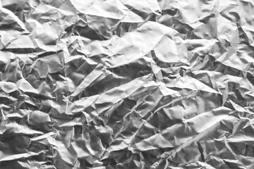 Shiny silver gray foil texture background industry.

