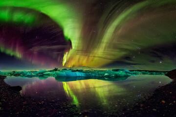 northern lights aurora in Jokulsarlon glacial river lagoon