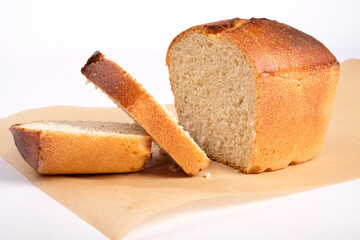 sliced golden crispy bread baked in the oven close up