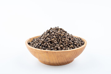 A saucer of cassia tea on white background