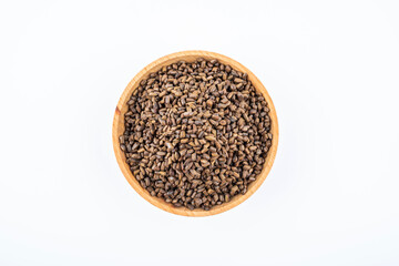 A saucer of cassia tea on white background