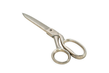 old sewing scissors on white