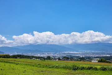 夏の風景 山麓線沿いから塩尻市内と山々を望む 長野県塩尻市