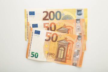 Banknotes of euro on white background. Place for text.