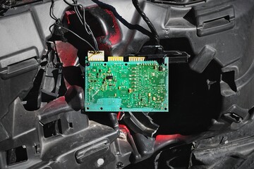 Metal parts of the red car after crash