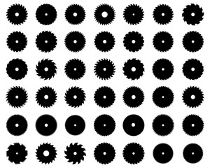 Black silhouettes of circular saw blades on white background