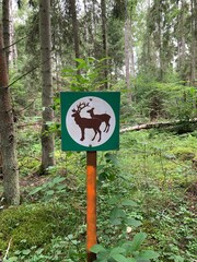 Wild animals warning sign at cognitive walkway of Musos Tyrelis.