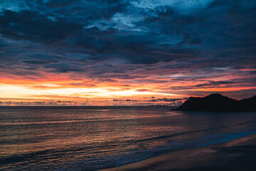 Fototapeta na wymiar Colourful cloudy dusk sky of the sea in Thailand.