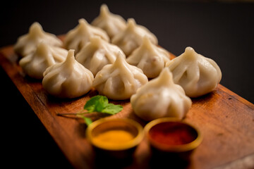 Modak is an Indian sweet popular in states of Maharashtra, Goa. The sweet filling on the inside consists of freshly grated coconut and jaggery while the outer shell is made from rice flour or semolina