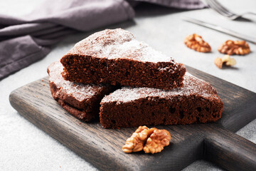 Homemade chocolate brownie with walnuts. Baking chocolate cake. copy space