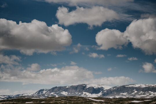 Clouds in the mountains. Hallingskarvet National park in Norway.