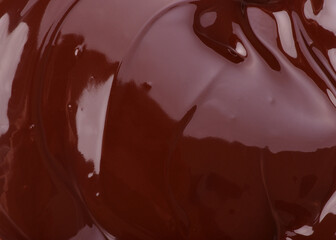 Melted chocolate natural dark background
