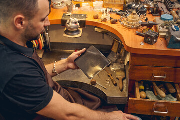 Man holding a tablet computer in his hand