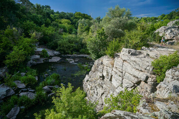 large stone rock against a stormy sky
