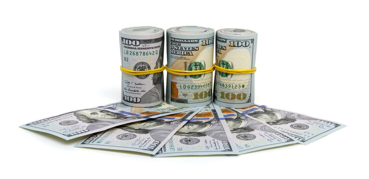 Hundred dollar bills rolled up with rubberband