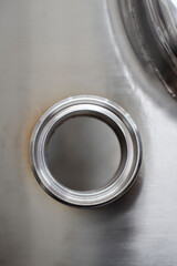 Metal hole with chrome machine fragments 