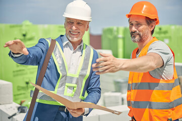 Caucasian male engineers staring into the distance