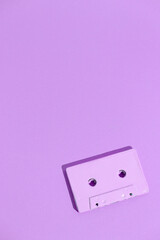 Minimal aesthetic still life monochrome design. Purple trends. Audio cassette