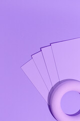 Minimal aesthetic still life monochrome design. Purple colours trends. Paper and geometry.