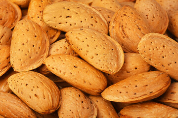 Dried almonds closeup, background