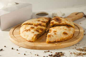 Stuffed qeema minced meat naan with herbs and spices and white butter