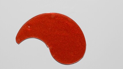 red under eye patch from above. Top view of one