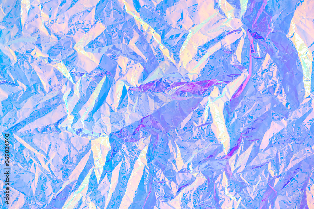Poster blurred abstract modern pastel colored holographic background in 80s style. crumpled iridescent foil