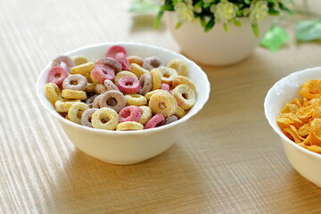 Bowls with different sorts of breakfast cereal products. white bowls with morning meal