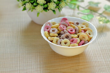Bowls with different sorts of breakfast cereal products, white bowls with morning meal