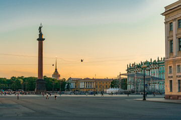 Fototapeta na wymiar St Petersburg/ Russia - 27 July 2020: Palace square with tourists in the summer evening in Saint Petersburg, the concept of Russian tourism