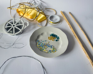 various tools and accessories for making a pearl crown, handmade, spending free time at home, cutlery